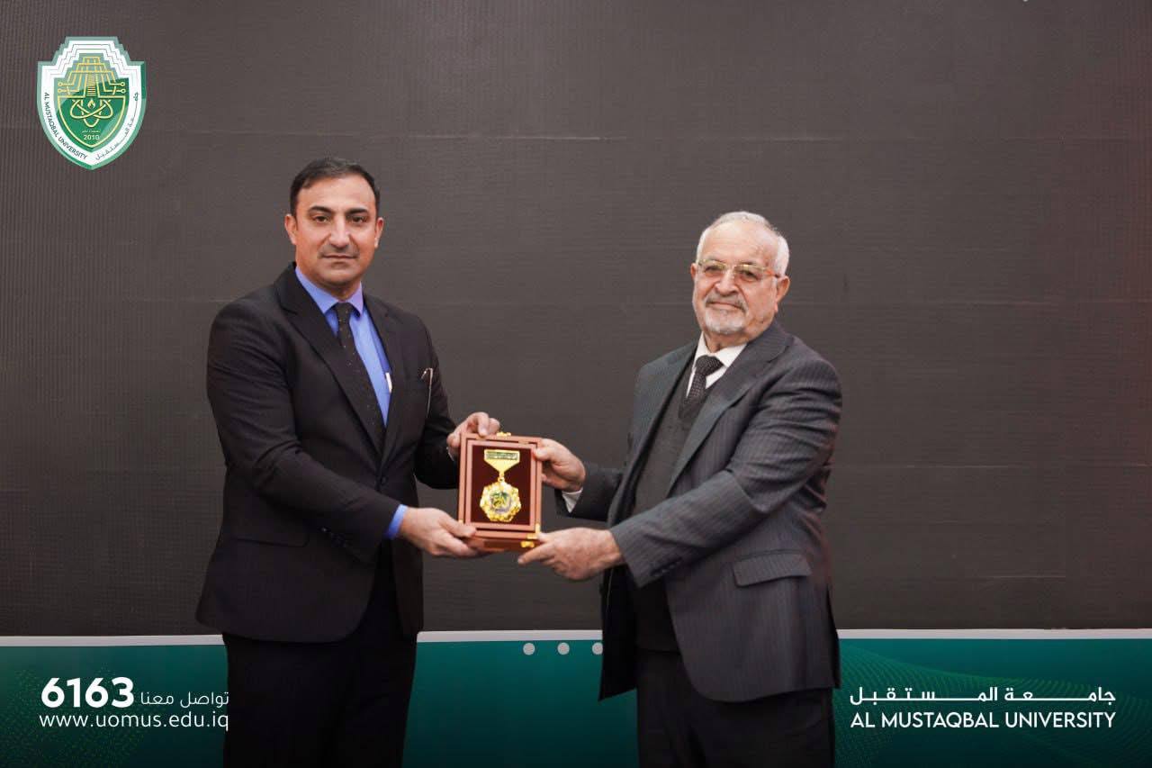 Honoring the Head of the Department of Biology Sciences, Professor Dr. Ali Shaalan Amailf, and receiving the Creativity Shield